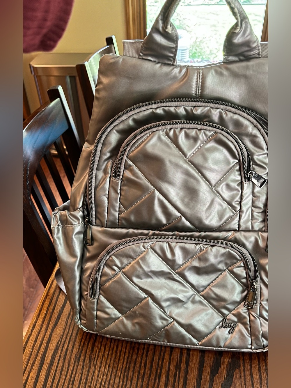 lug Hatchback Metallic Gray Quilted Backpack with Multiple Pockets